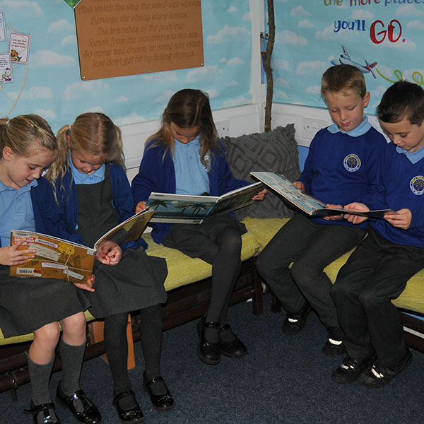 Primary school children reading